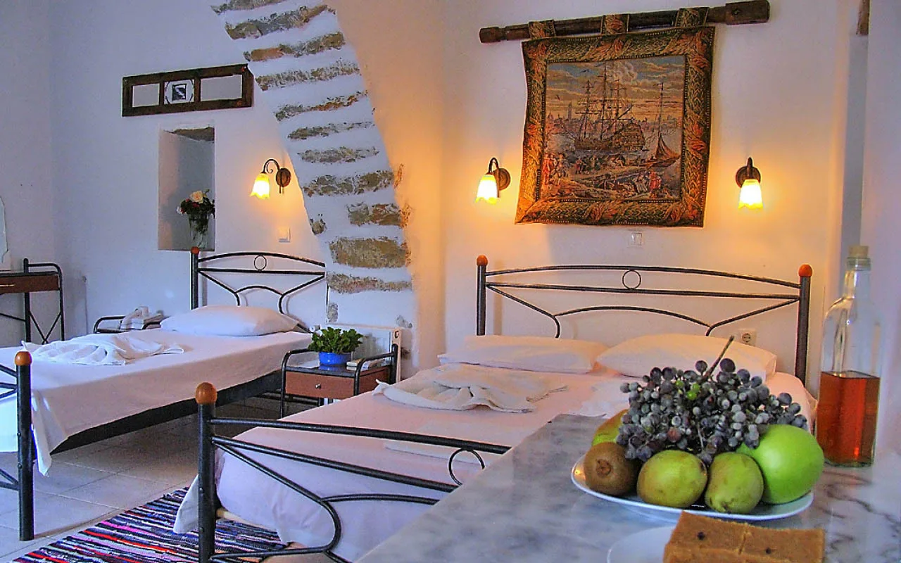 Polytimi amorgos traditional stone room with two beds