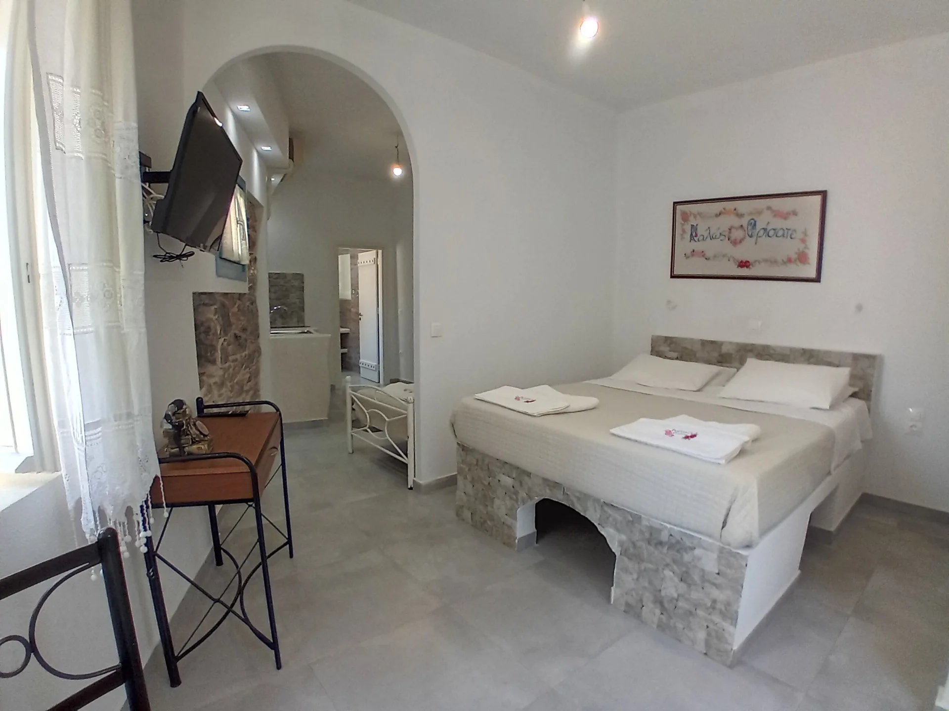 Politimis studios traditional room with double bed
